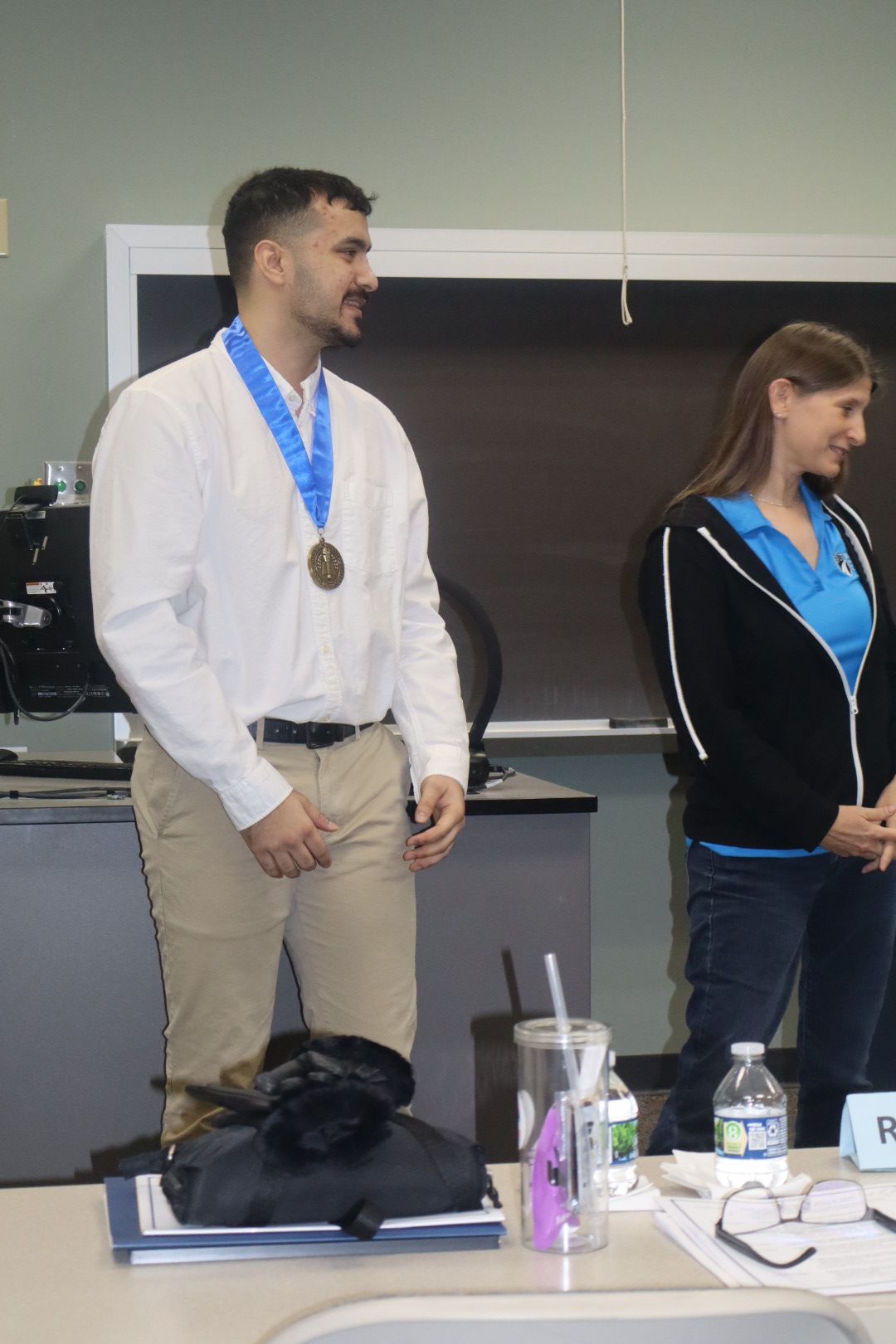 receiving the Honors Medallion after completing Part II of the Sip Success Online project.