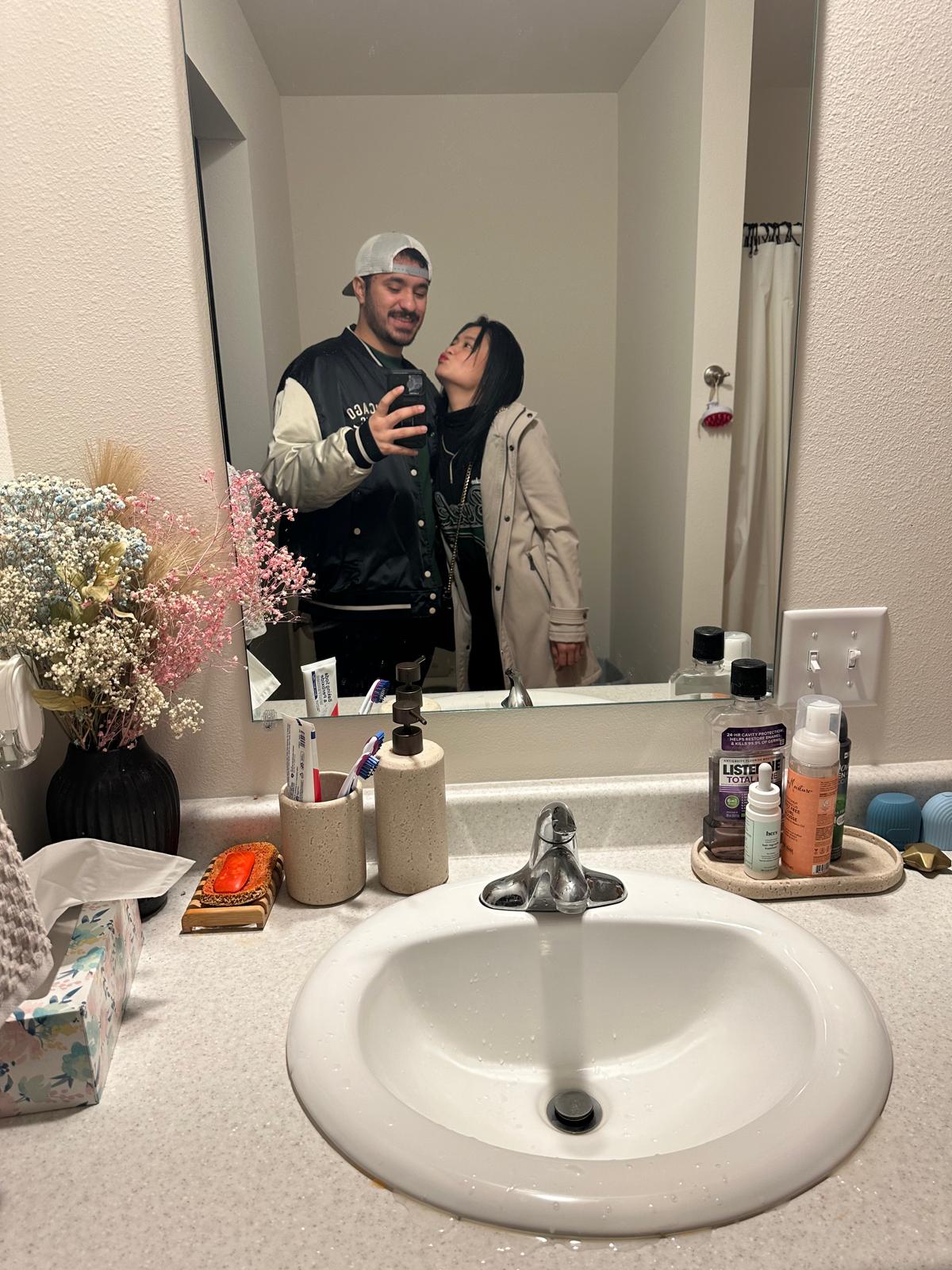 Pre-game mirror selfie in Bucks gear