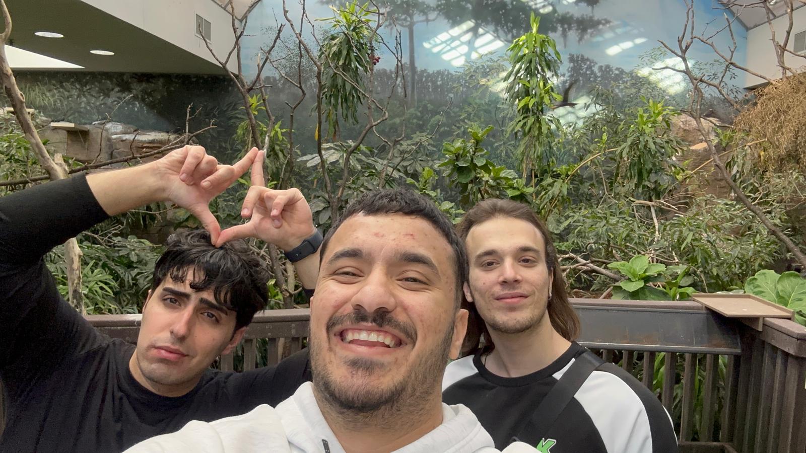 At the zoo in front of animal exhibits