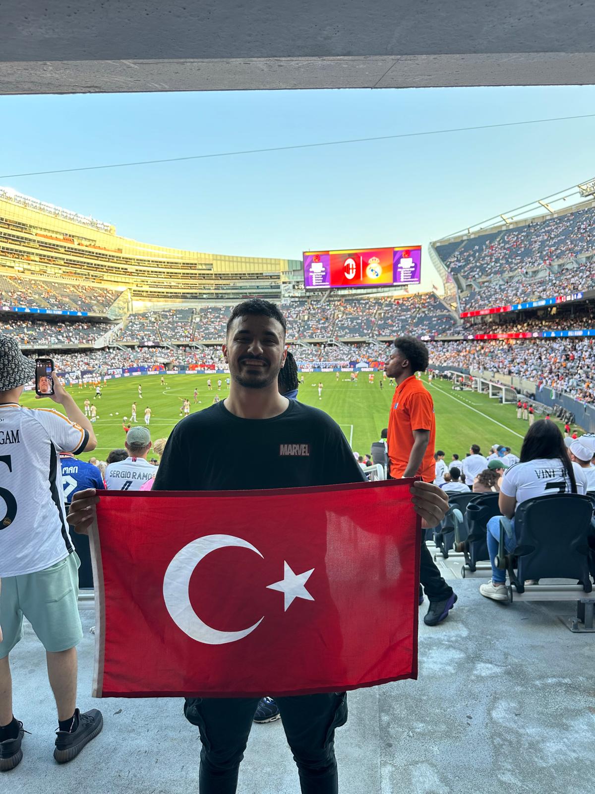 Holding Turkish flag at Real Madrid game