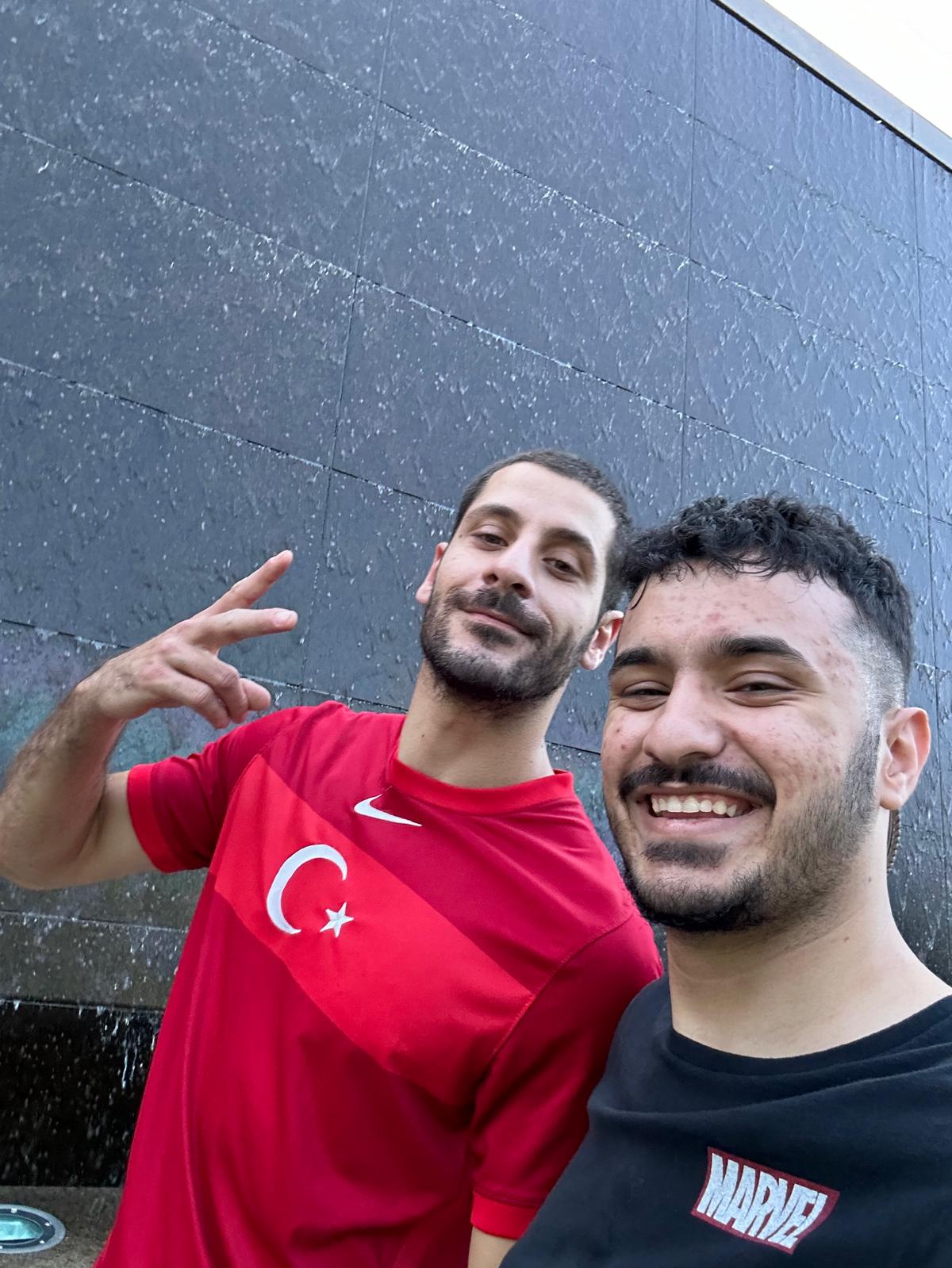 Furkan with friend wearing Turkish shirts