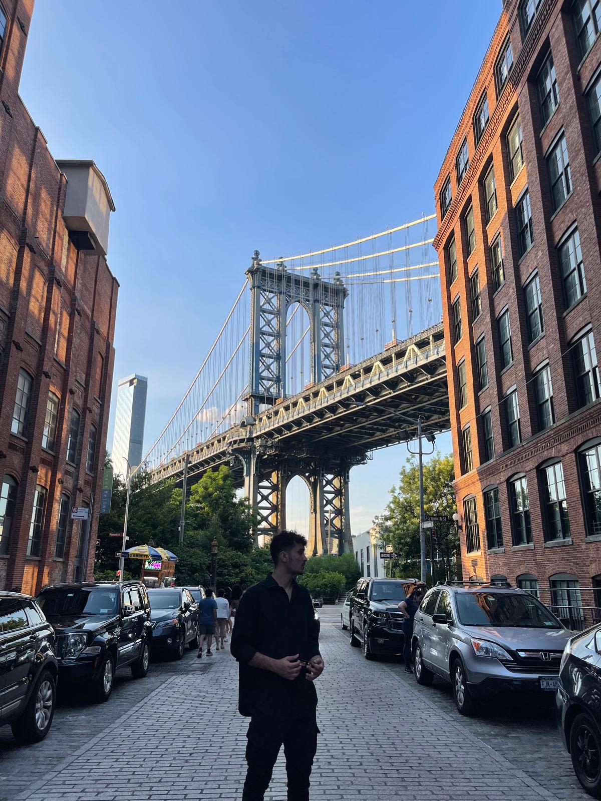 Walking under Brooklyn Bridge in NYC