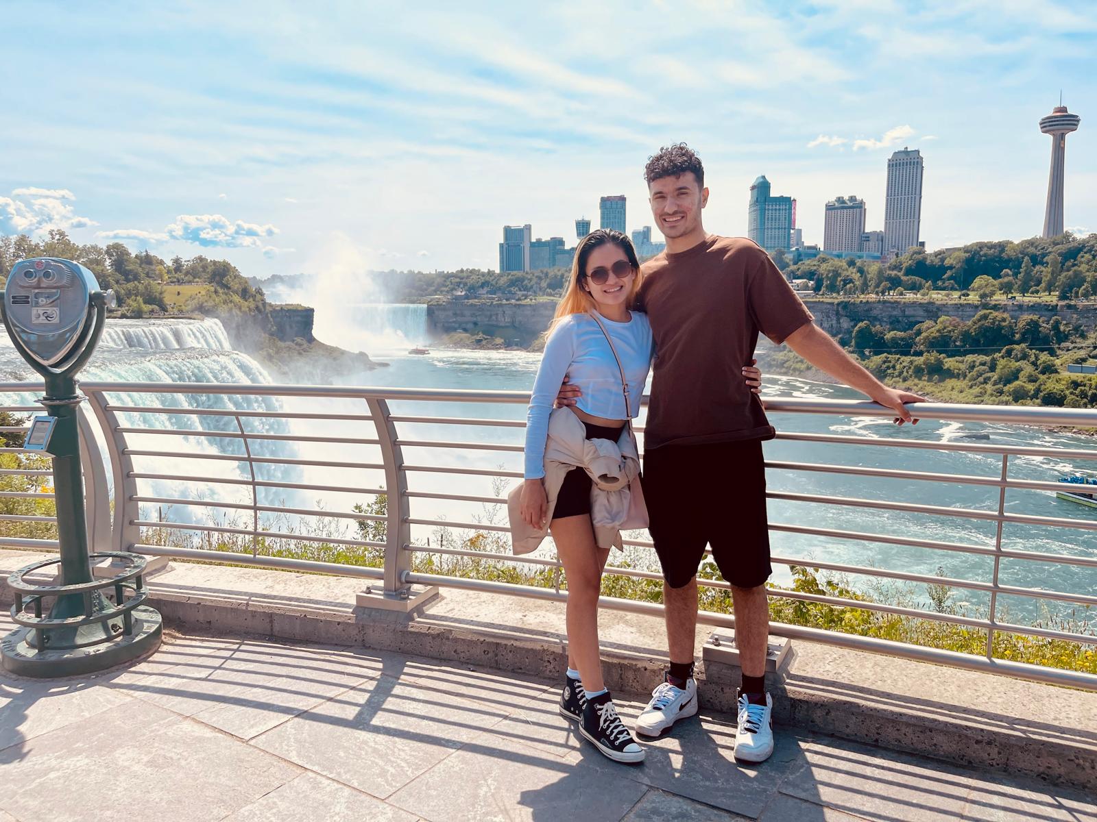 Posing near the Niagara River with Canada in the background