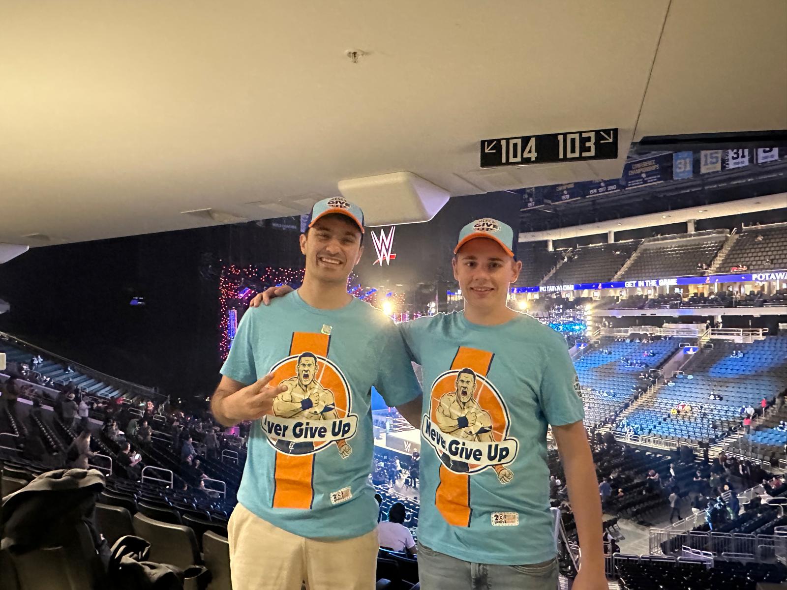 Posing inside arena in John Cena merch